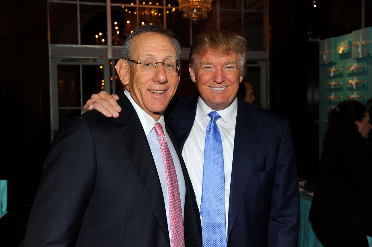 Billionaire real estate tycoon Stephen Ross buddies up with Donald Trump at an event in 2010.  (Photo: Andrew H. Walker via Getty Images)