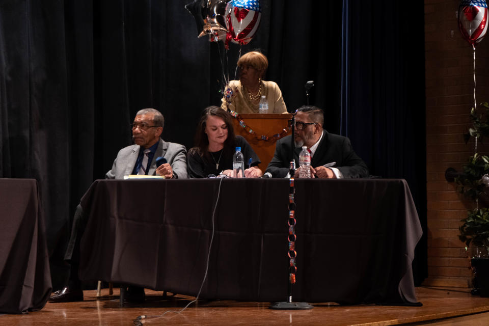 Moderator David Lovejoy asks a question to candidates Monday night at the Greater North Heights Neighborhood Association candidate forum at Carver Elementary School in Amarillo.