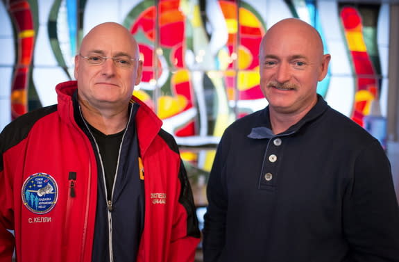 NASA astronaut Scott Kelly (left) will spend a year in space onboard the International Space Station. His identical twin brother Mark Kelly (right) will help scientists with experiments on the ground to give them a wide amount of data during Sc