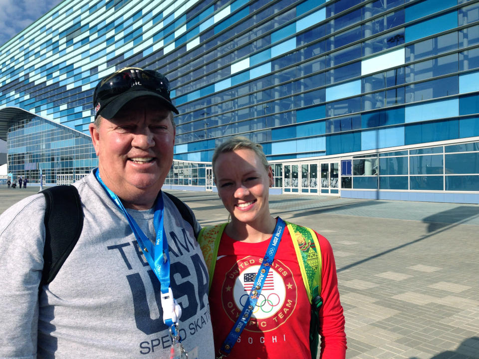 Short track skater Emily Scott of the United States poses with her father Craig Scott of Springfield, Mo., outside the Iceberg Skating Palace during the 2014 Winter Olympics, Friday, Feb. 14, 2014, in Sochi, Russia. Scott has overcome money troubles and family strife to realize her goal of competing in the Olympics. Along the way, the 24-year-old short track skater from Springfield, Mo., has picked up hundreds of fans who shelled out as little as $5 to help her stay in training. (AP Photo/Beth Harris)