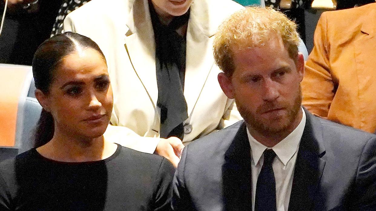 Meghan Markle and Prince Harry looking glum in black attire