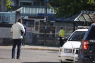 <p>Police investigate a deadly stabbing on a Metropolitan Area Express train in northeast Portland, Ore., Friday, May 26, 2017. Police in Oregon say several people died and another was hurt in a stabbing on a Portland light-rail train after a man yelled racial slurs at two young Muslim women. (Jim Ryan/The Oregonian via AP) </p>