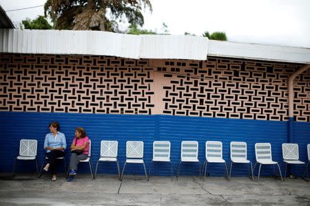 An empty polling station is seen after being closed and relocated during a nationwide election for new governors in Caracas, Venezuela, October 15, 2017. REUTERS/Carlos Garcia Rawlins