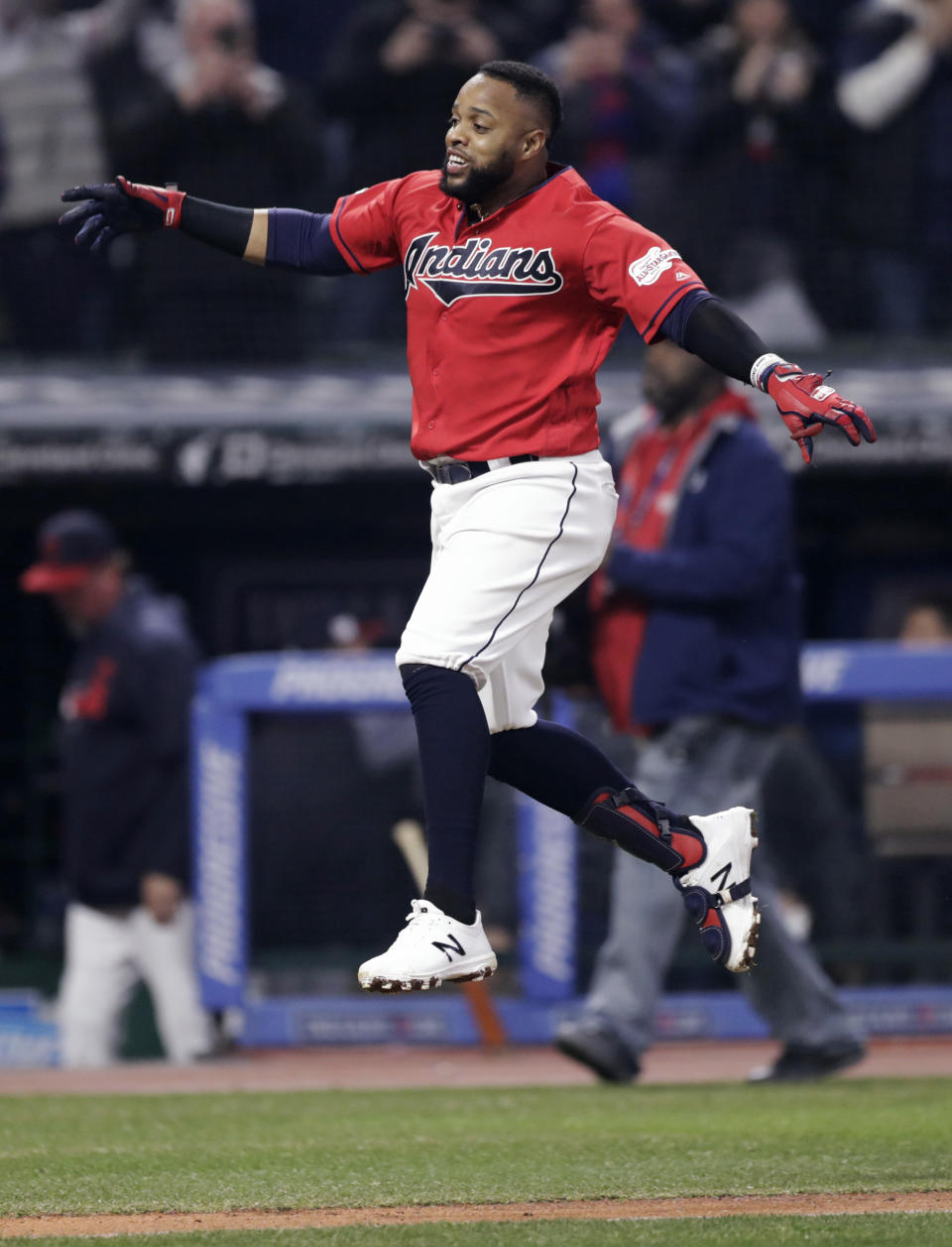 Cleveland Indians' Carlos Santana celebrates after hitting a solo home run off Toronto Blue Jays relief pitcher Joe Biagini during the ninth inning of a baseball game Friday, April 5, 2019, in Cleveland. The Indians won 3-2. (AP Photo/Tony Dejak)