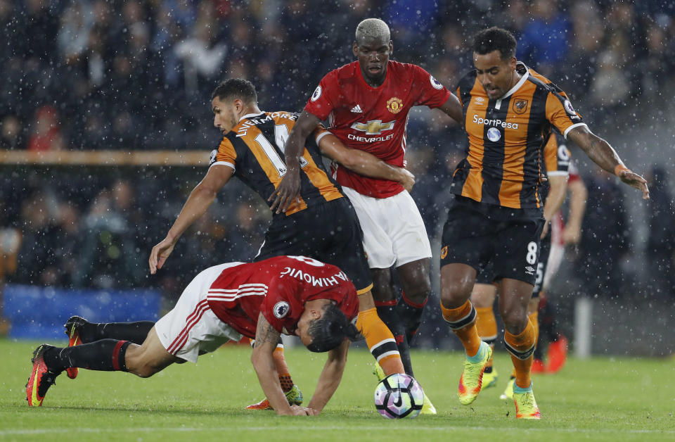 Football Soccer Britain- Hull City v Manchester United - Premier League - The Kingston Communications Stadium - 27/8/16 Manchester United's Paul Pogba and Zlatan Ibrahimovic in action with Hull City's Jake Livermore and Tom Huddlestone Action Images via Reuters / Lee Smith Livepic EDITORIAL USE ONLY. No use with unauthorized audio, video, data, fixture lists, club/league logos or "live" services. Online in-match use limited to 45 images, no video emulation. No use in betting, games or single club/league/player publications. Please contact your account representative for further details.