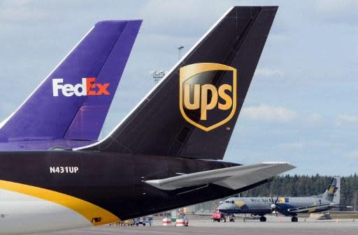 國際物流公司 FedEx 與 UPS (圖:AFP)