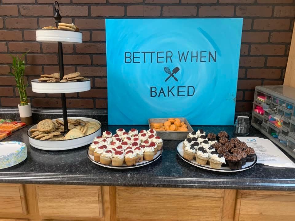 Heather Palmer, owner of Better When Baked, sets up a sweets table at a West Coast Swing Dancers event, September 2021.