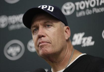 FILE - In this Sunday, Dec. 28, 2014, file photo, New York Jets head coach Rex Ryan listens to a questions during a news conference following an NFL football game against the Miami Dolphins, in Miami Gardens, Fla. Jets owner Woody Johnson fired Ryan and general manager John Idzik on Monday, Dec. 29, 2014, after one of the most disappointing seasons in franchise history. (AP Photo/Lynne Sladky, File)