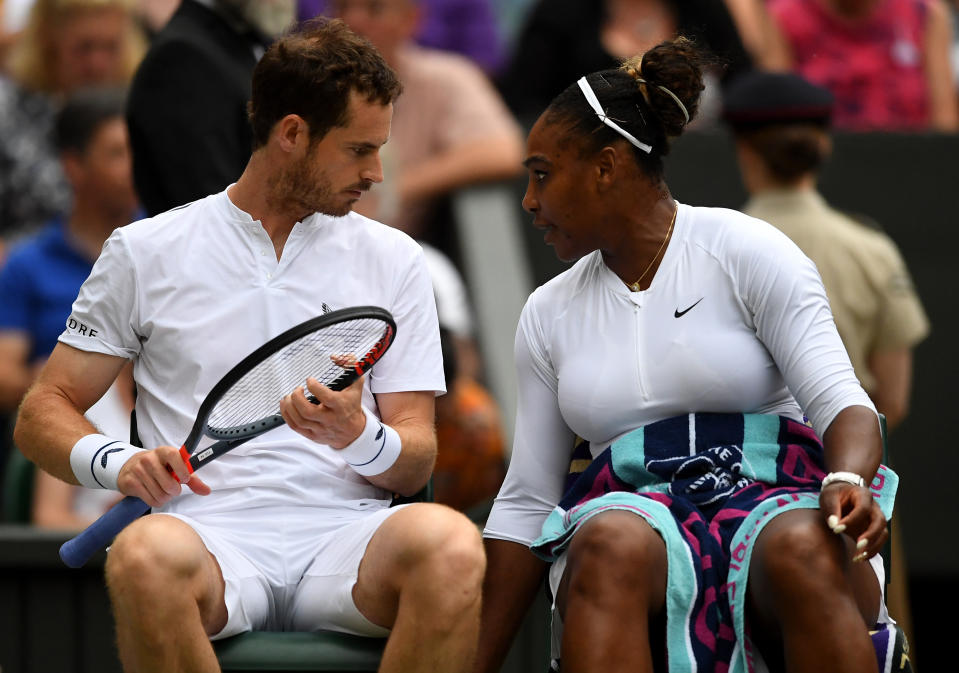 Andy Murray and Serena Williams during their mixed doubles match on day eight of the Wimbledon Championships at the All England Lawn Tennis and Croquet Club, Wimbledon.