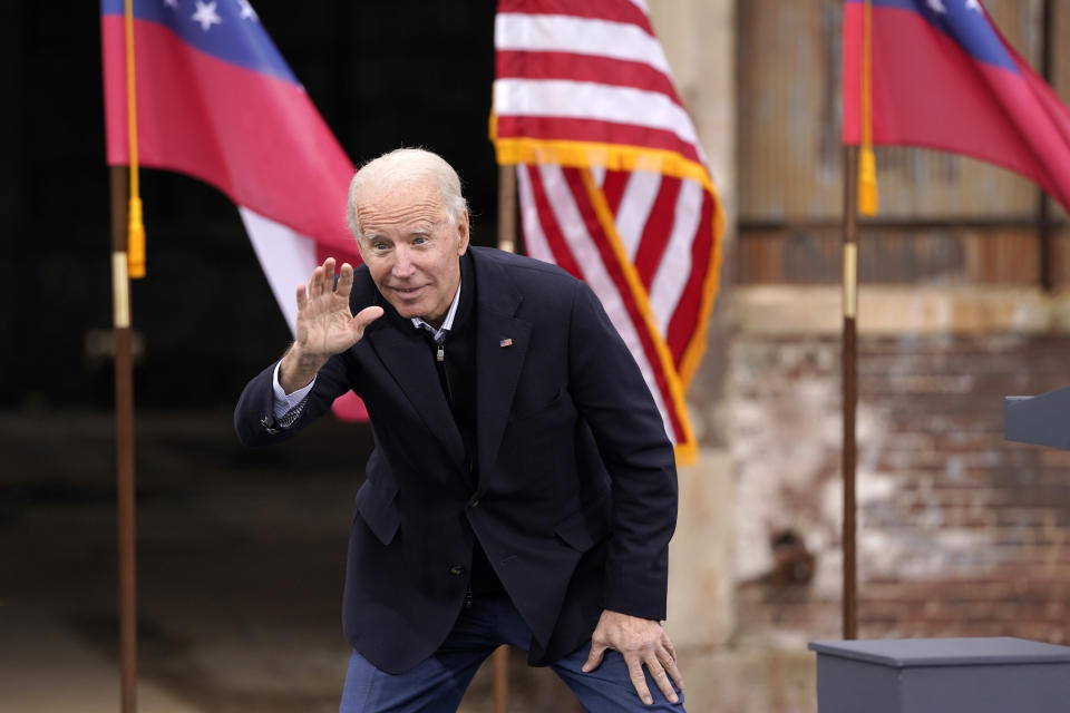 ATLANTA, GA - DECEMBER 15: U.S. President-elect Joe Biden gestures to the crowd as he delivers remarks during a drive-in rally for U.S. Senate candidates Jon Ossoff and Rev. Raphael Warnock at Pullman Yard on December 15, 2020 in Atlanta, Georgia. Biden’s stop in Georgia comes less than a month before the January 5 runoff election for Ossoff and Warnock as they try to unseat Republican incumbents Sen. David Perdue and Sen. Kelly Loeffler.  (Photo by Drew Angerer/Getty Images)