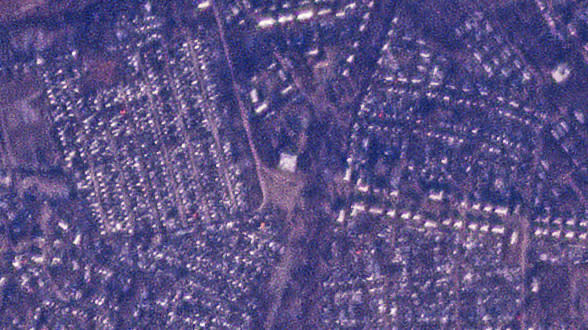 This satellite photo from Planet Labs PBC shows a vocational school in the Russian-occupied town of Makiivka, Ukraine, Dec. 20, 2022. Satellite photos analyzed by The Associated Press on Tuesday, Jan. 3, 2023, show the aftermath of a major strike by Ukrainian forces that Moscow says killed 63 Russian troops. (Planet Labs PBC via AP)