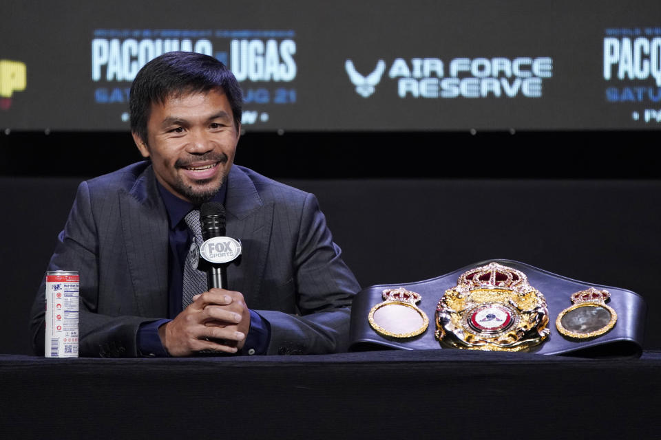 Manny Pacquiao, of the Philippines, attends a news conference Wednesday, Aug. 18, 2021, in Las Vegas. Pacquiao is scheduled to fight Yordenis Ugas, of Cuba, in a welterweight championship bout Saturday in Las Vegas. (AP Photo/John Locher)
