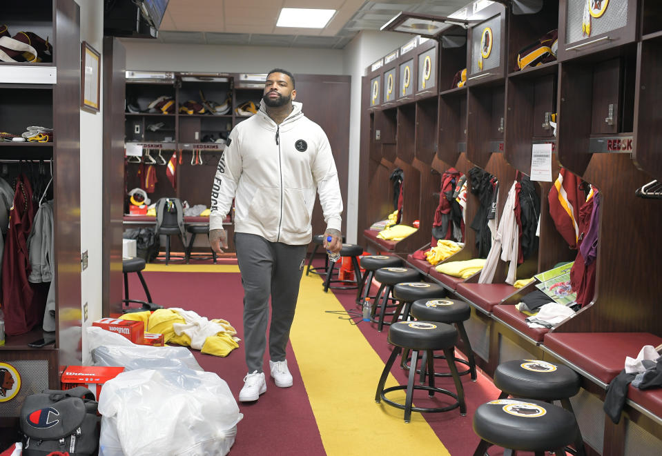 ASHBURN, VA- DECEMBER 31:  Washington Redskins offensive tackle Trent Williams (71) walks through the locker room as the Redskins clean out lockers after last game of season at Redskins Park in Ashburn, VA on December 31, 2018.  (Photo by John McDonnell/The Washington Post via Getty Images)