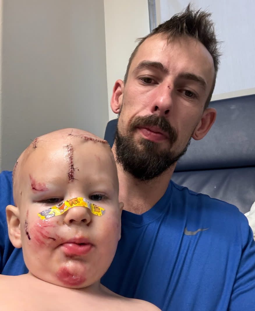 
		Levi Bernard at the hospital with youngest son, Sunny (Courtesy Bernard family)

        