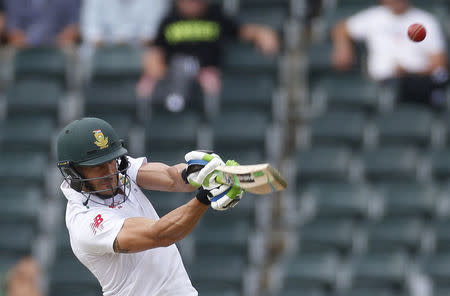 South Africa's Faf du Plessis plays a shot during the third cricket test match against England in Johannesburg, South Africa, January 14, 2016. REUTERS/Siphiwe Sibeko
