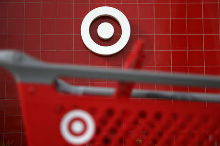 A Target shopping cart is seen in front of a store logo in Azusa, California U.S. November 16, 2017. REUTERS/Lucy Nicholson