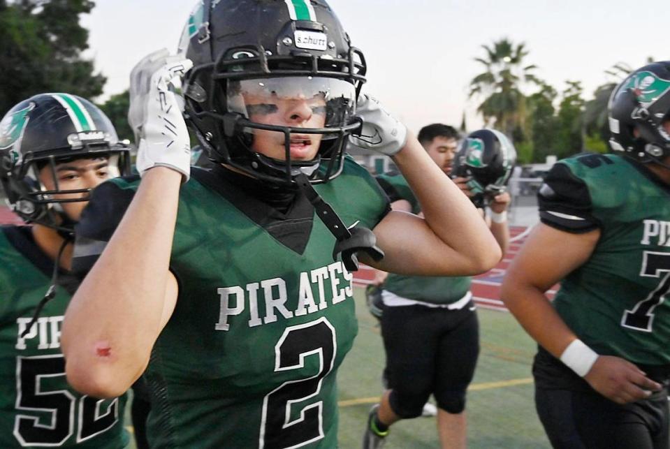 Reedley’s Malachi Rios runs to the sidelines for the start of the game against Roosevelt Friday night, Aug. 25, 2023 in Reedley.