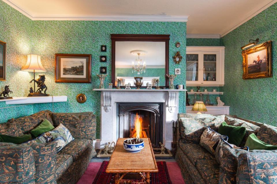 Eastern Daily Press: The sitting room offers a place to relax by the fire