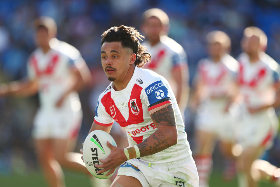 Seen here, Dragons young gun Jayden Sullivan runs the ball during the round 19 NRL match against the Gold Coast Titans in 2021. 