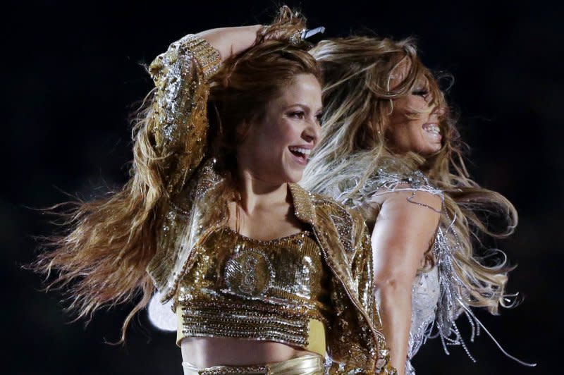 Shakira (L) and Jennifer Lopez perform at the Super Bowl LIV halftime show in 2020. File Photo by John Angelillo/UPI