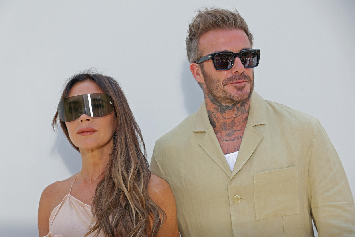 Victoria and David Beckham attend a fashion show at the Palace of Versailles on June 26 in Versailles, France. (Pascal Le Segretain/Getty Images)