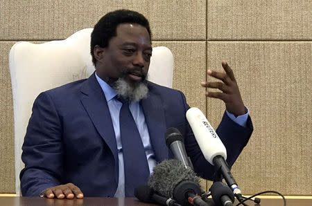 FILE PHOTO: Democratic Republic of Congo's President Joseph Kabila speaks during a Reuters interview at the Palais de la Nation in Kinshasa, Democratic Republic of Congo, December 9, 2018. REUTERS/Benoit Nyemba-/File Photo