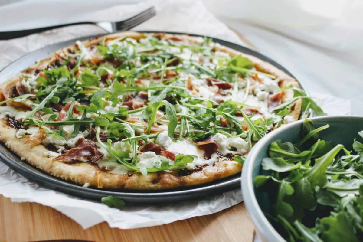 <p>Keen for Keto</p><p>Keto-friendly pizza with the best low-carb pizza crust and topped with tomato-free balsamic pizza sauce and prosciutto, goat cheese and arugula!</p><p><strong>Get the Recipe: </strong><a href="https://keenforketo.com/keto-goat-cheese-pizza-with-prosciutto-and-arugula/" rel="nofollow noopener" target="_blank" data-ylk="slk:Keto Goat Cheese Pizza with Prosciutto and Arugula;elm:context_link;itc:0;sec:content-canvas" class="link rapid-noclick-resp"><strong>Keto Goat Cheese Pizza with Prosciutto and Arugula</strong></a></p>