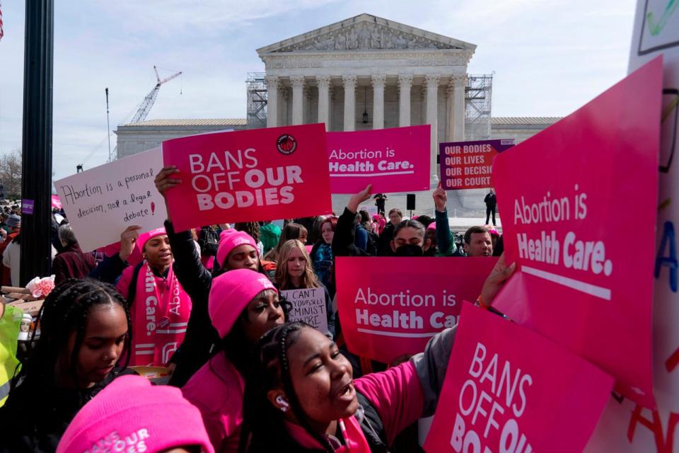 PHOTO: Abortion-rights activists rally outside the Supreme Court, March 26, 2024, in Washington.  (Jose Luis Magana/AP)