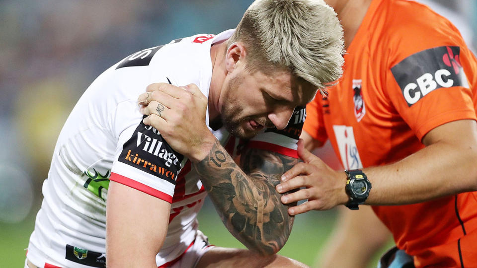Gareth Widdop holds his injured shoulder during the round 22 NRL match against the Parramatta Eels. (Photo by Mark Metcalfe/Getty Images)