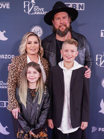 <p>Marty Jean-Louis / Alamy</p> Zach Williams and his family walk the Red Carpet during the 52nd Annual GMA Dove Awards in October 2021 in Nashville, Tennessee