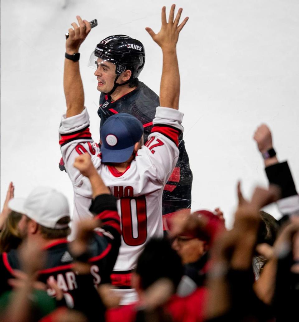 Carolina Hurricanes’ Seth Jarvis (24) reacts with fans after Martin Necas’ game winning goal to secure a 3-2 overtime victory over Ottawa on Tuesday, April 4, 2023 at PNC Arena in Raleigh, N.C.