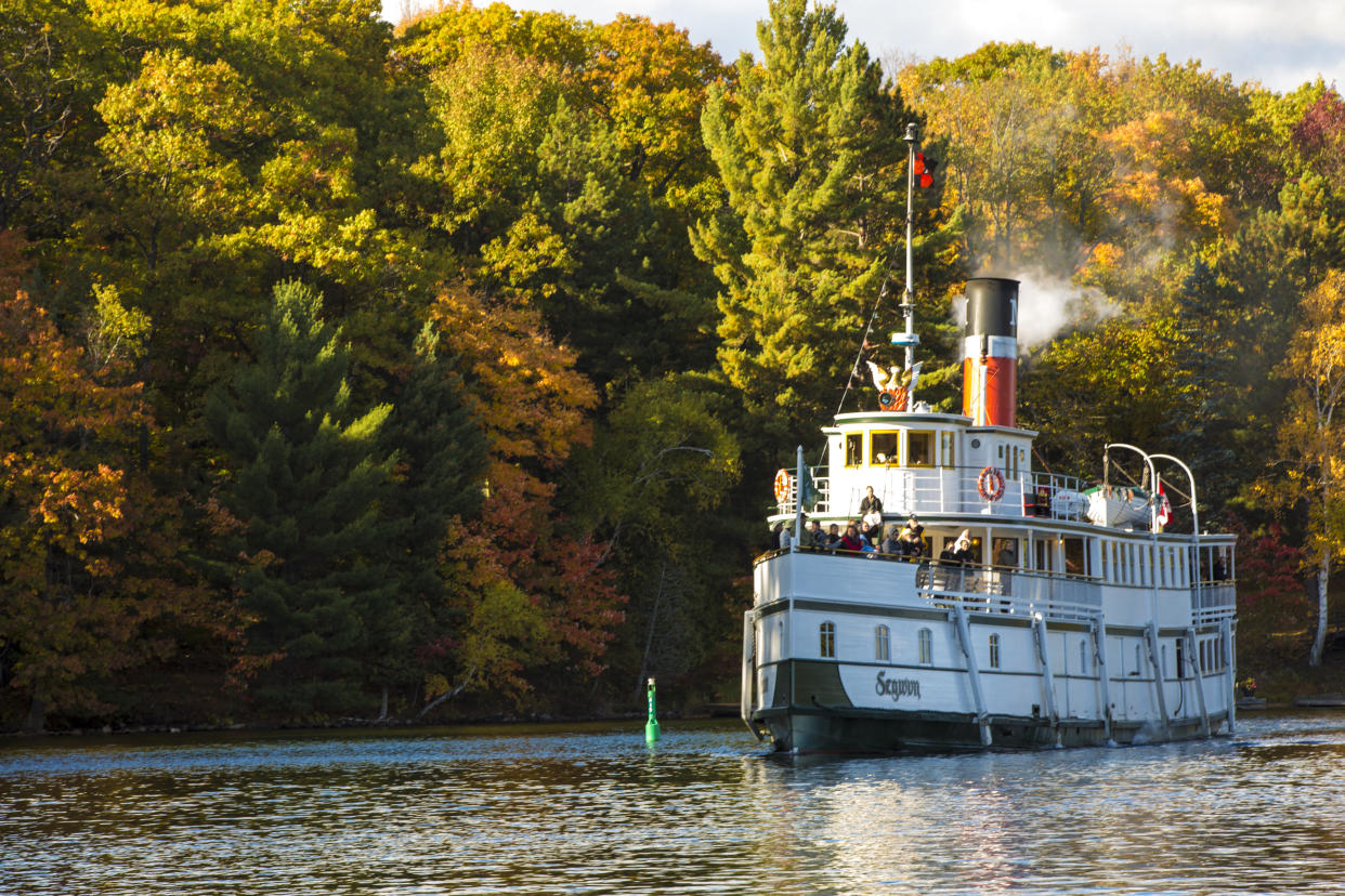 The RMS Royal Mail Ship Segwun sails on Lake Muskoka with fall colours leaves in the background. PHOTO COURTESY MUSKOKA STEAMSHIPS.