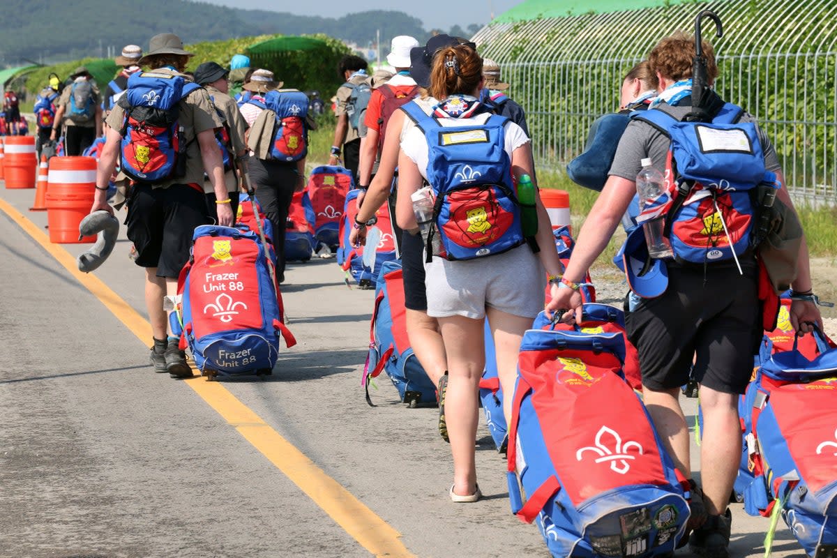 British Scouts leave the World Scout Jamboree campsite in Buan, South Korea (AP)