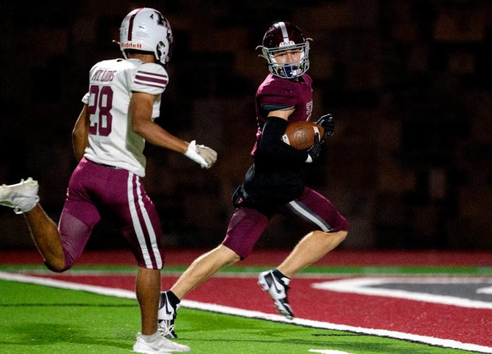 Altoona’s Branson Adams can’t stop State College’s Ty Salazar as he runs in for a touchdown during the third quarter of the game on Friday, Sept. 15, 2023.