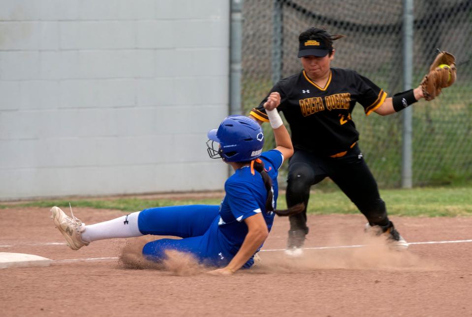 Bear Creek's Gianna Galli slides safely past Stagg's Bella "Jorge" Hernandez at third during a varsity softball game at Bear Creek in Stockton on Wednesday, May 3, 2023.  Bear Creek won 14-4.