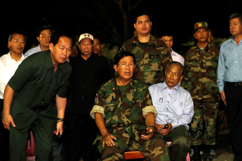 Cambodia PM Hun Sen visits the site where a building being under construction collapsed in Kep