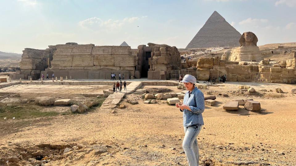 UNCW Professor Eman Ghoneim studies the surface topography of the section of the ancient Ahramat branch located in front of the Pyramids of Giza and the Great Sphinx. Photo Credit: Eman Ghoneim/UNCW