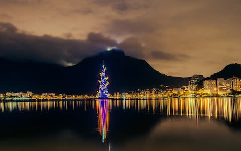 December in Rio, for me, means midsummer sundowners with the world’s largest floating Christmas tree - Credit: EDUARDO NUCCI