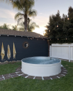 <p>Hang string lights above your stock tank pool to create the perfect backyard oasis. </p><p><strong>See more at</strong> <strong><a href="https://www.arrowsandbow.com/diy-stock-tank-pool" rel="nofollow noopener" target="_blank" data-ylk="slk:Arrows + Bow;elm:context_link;itc:0;sec:content-canvas" class="link ">Arrows + Bow</a>.</strong></p><p><a class="link " href="https://www.amazon.com/Backyard-Hanging-Outdoor-Pergola-Deckyard/dp/B00RQHBZVS/ref=sr_1_12?tag=syn-yahoo-20&ascsubtag=%5Bartid%7C10050.g.3404%5Bsrc%7Cyahoo-us" rel="nofollow noopener" target="_blank" data-ylk="slk:SHOP STRING LIGHTS;elm:context_link;itc:0;sec:content-canvas">SHOP STRING LIGHTS</a></p>