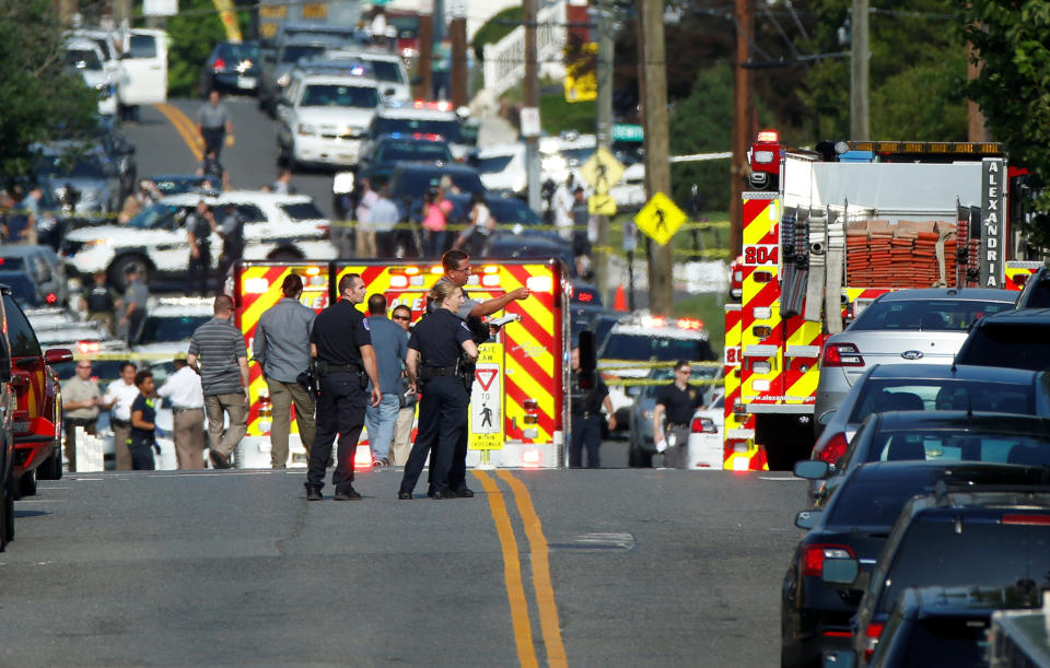 Police investigate after the shooting.