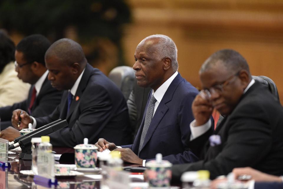 FILE - In this file photo dated Tuesday, June 9, 2015, Angolan President Jose Eduardo Dos Santos, second right, during a meeting with Chinese President Xi Jinping at the Great Hall of the People in Beijing. dos Santos announced Friday Feb. 3, 2017, in an address to his ruling MPLA party that he will not run in elections scheduled for August 2017, ending his 38 years in power.(Wang Zhao/FILE via AP)