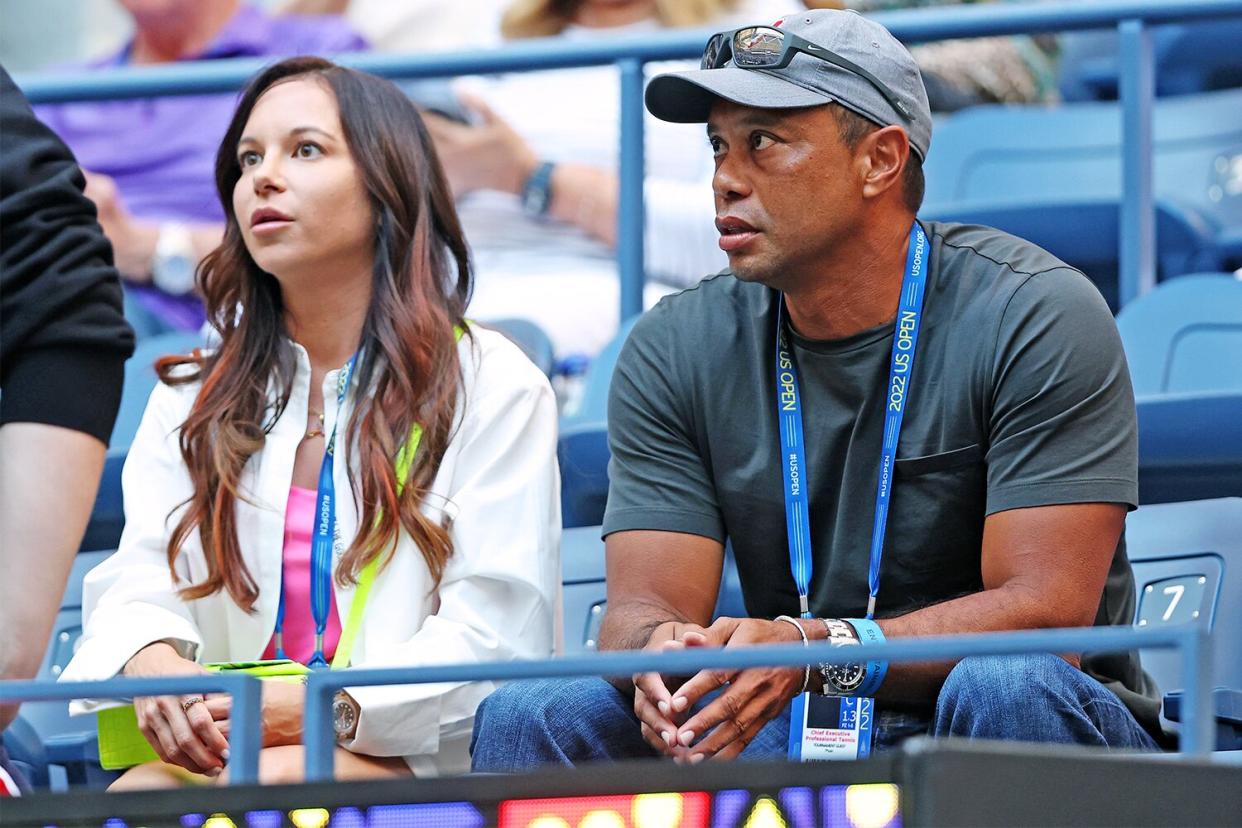 NEW YORK, NEW YORK - AUGUST 31: Erica Herman and Tiger Woods look on prior to the match between Anett Kontaveit of Estonia and Serena Williams of the United States in their Women's Singles Second Round match on Day Three of the 2022 US Open at USTA Billie Jean King National Tennis Center on August 31, 2022 in the Flushing neighborhood of the Queens borough of New York City. (Photo by Matthew Stockman/Getty Images)