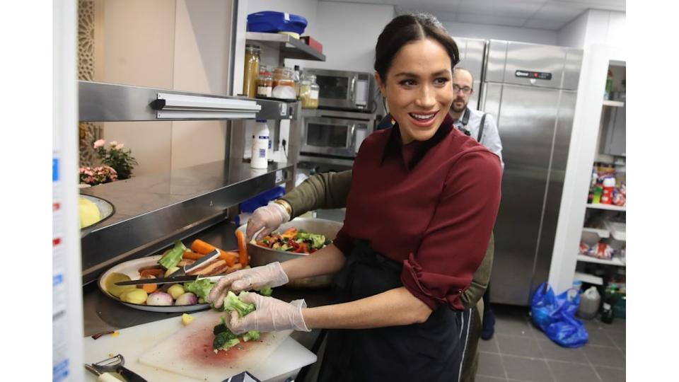 Meghan prepping food at the Hubb Community Kitchen