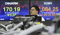 A currency trader works at the foreign exchange dealing room of the KEB Hana Bank headquarters in Seoul, South Korea, Monday, June 10, 2019. Asian financial markets advanced on Monday after China released better-than-expected trade data for May. Gains were reined in by worries over where the world’s two largest economies stood on trade negotiations. (AP Photo/Ahn Young-joon)
