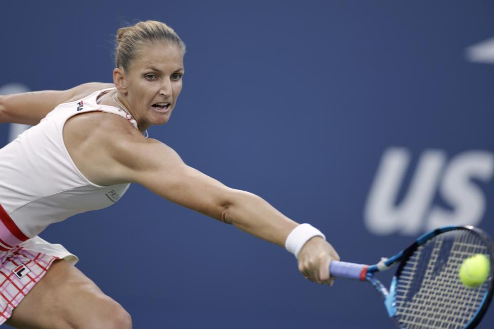 Karolina Pliskova, of the Czech Republic, returns a shot to Belinda Bencic, of Switzerland, during the third round of the U.S. Open tennis championships, Saturday, Sept. 3, 2022, in New York. (AP Photo/Adam Hunger)