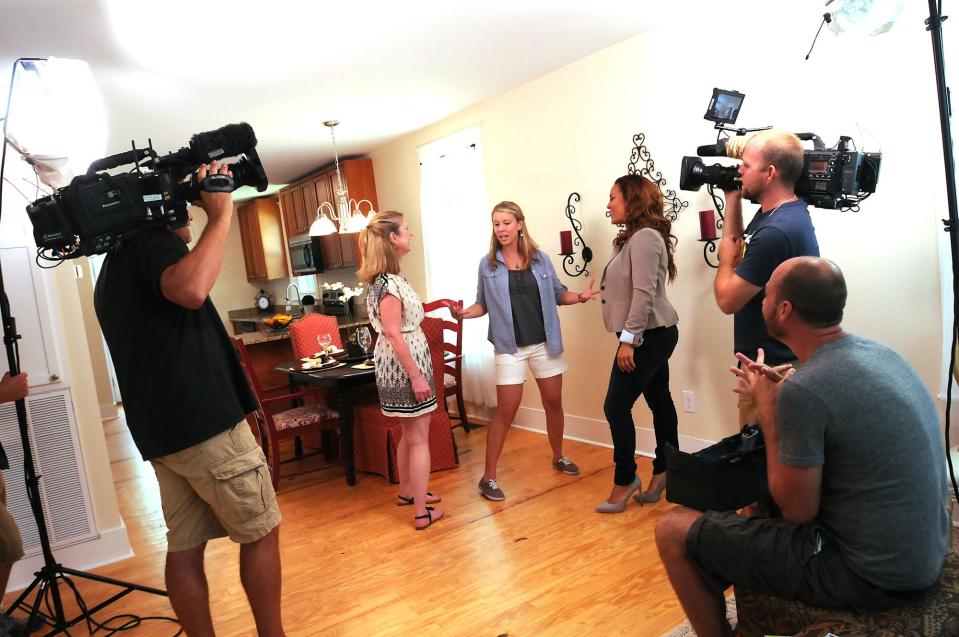 From left, Marilyn Tschudi and Nicki Tschudi talk with host Egypt Sherrod while on set of HGTV's "Property Virgins," which filmed episodes in Wilmington in 2014.