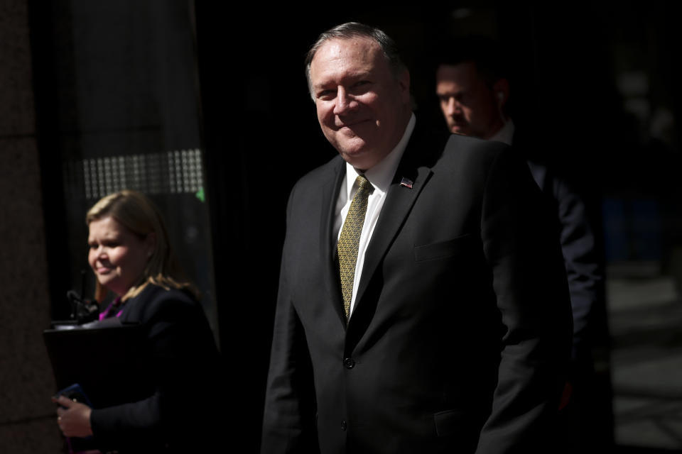 U.S. Secretary of State Mike Pompeo, center, leaves after a meeting at the Europa building in Brussels, Monday, May 13, 2019. (AP Photo/Francisco Seco)