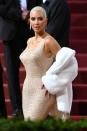 <p>The Met Gala 2022 came and went, and the most controversial moment was hands-down <a href="https://www.teenvogue.com/story/kim-kardashian-marilyn-monroe-dress-met-gala-2022?mbid=synd_yahoo_rss" rel="nofollow noopener" target="_blank" data-ylk="slk:Kim Kardashian wearing Marilyn Monroe's "Happy Birthday, Mr. President" dress from 1962;elm:context_link;itc:0;sec:content-canvas" class="link ">Kim Kardashian wearing Marilyn Monroe's "Happy Birthday, Mr. President" dress from 1962</a>. After much speculation online, the star put an end to the rumors when she stepped on the red carpet (with newly bleached blonde hair) in the <em>extremely</em> delicate piece pulled from Ripley's Believe It or Not! museum, which <a href="https://www.teenvogue.com/story/ripleys-believe-it-or-not-museum-kim-kardashian-marilyn-monroe-hair?mbid=synd_yahoo_rss" rel="nofollow noopener" target="_blank" data-ylk="slk:also gifted Kim with a piece of the late star's hair;elm:context_link;itc:0;sec:content-canvas" class="link ">also gifted Kim with a piece of the late star's hair</a>. (Why? We don't know!)</p> <p>Kim only really wore Marilyn's actual dress for a few minutes on the red carpet and then had to change into a replica before entering the actual event. Kim's laborious efforts to wear the dress for a couple of minutes certainly didn't go unnoticed, but were they even necessary? Certainly not. Was her look on theme? Nope. And, to add fuel to the fire, she also <a href="https://www.teenvogue.com/story/kim-kardashian-met-gala-2022-comments-on-weight-loss-harmful-unnecessary?mbid=synd_yahoo_rss" rel="nofollow noopener" target="_blank" data-ylk="slk:went through some questionable weight loss measures;elm:context_link;itc:0;sec:content-canvas" class="link ">went through some questionable weight loss measures</a>, which she nonchalantly boasted about on the red carpet, to be able to fit into the dress.</p>