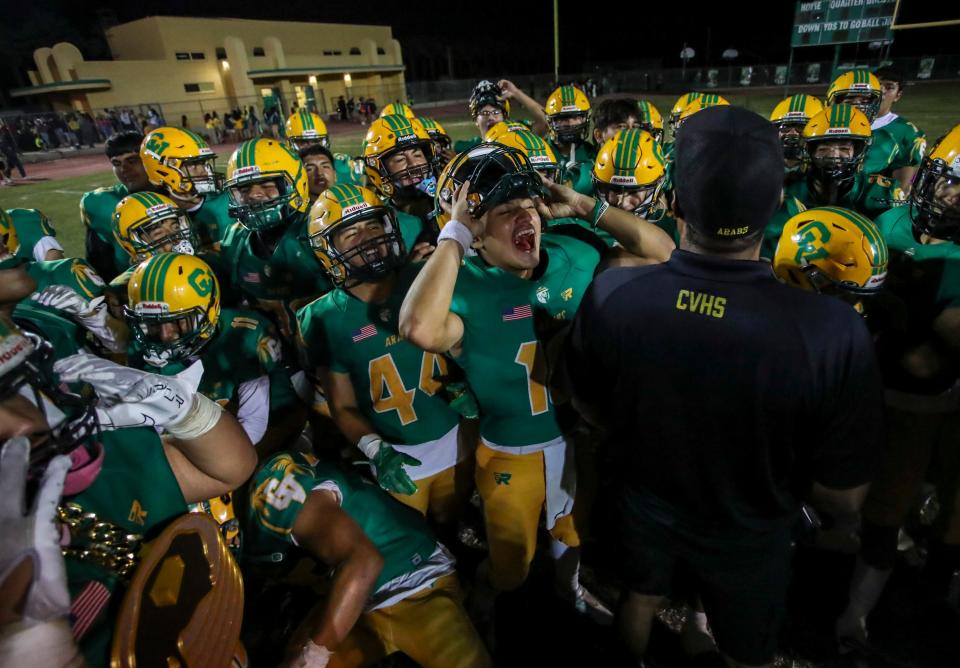 Coachella Valley players celebrate a win over Desert Hot Springs to remain undefeated after their game at Coachella Valley High School in Thermal, Calif., Friday, Sept. 22, 2023.