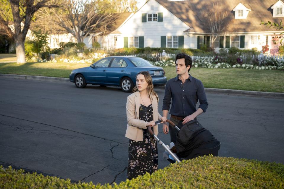 you l to r victoria pedretti as love quinn and penn badgley as joe goldberg in episode 301 of you cr john p fleenornetflix © 2021